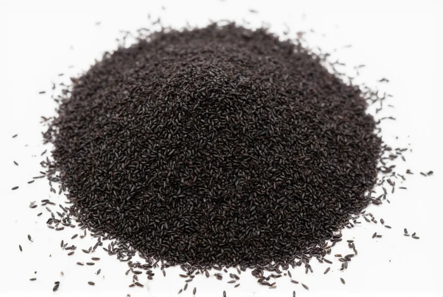 Close-up view of black sesame seeds next to white sesame seeds showing color difference