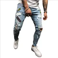 

Factory wholesale hot selling men's jeans fashionable young men's jeans with holes and small feet