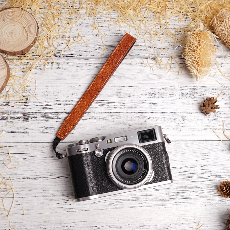 

Factory direct selling high quality handmade cowhide band genuine leather camera hand straps hot sale in Europe and America, As pics