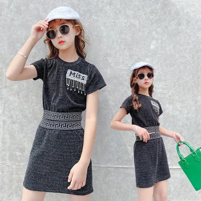 

2021 new summer teen girls clothing set Boutique printed short sleeve knit crystal top with skirt 2 pcs Clothing set, Picture shows