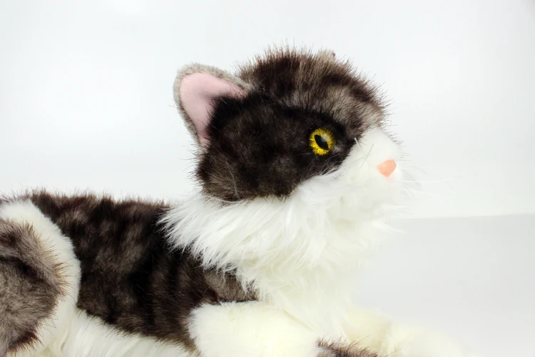 black and white soft toy cat