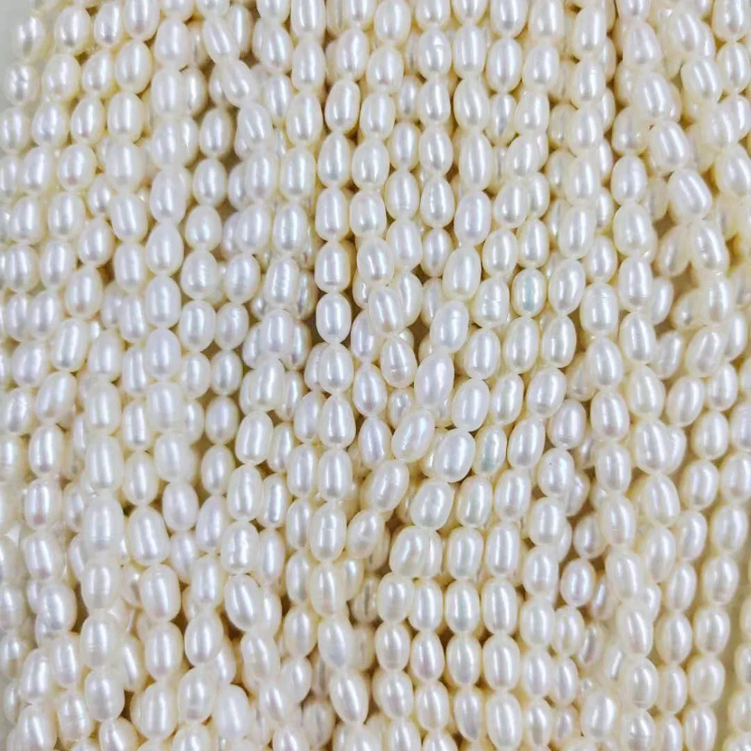 6-9 mm rice shape nature pearl wholesale freshwater loose pearl strandmini freshwater pearl AA good quality