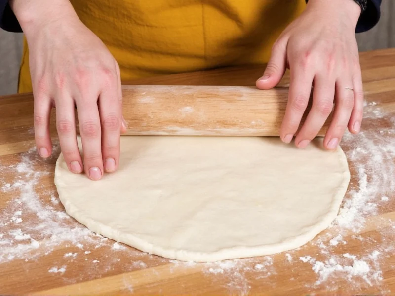 Hands rolling pie crust on floured wooden surface