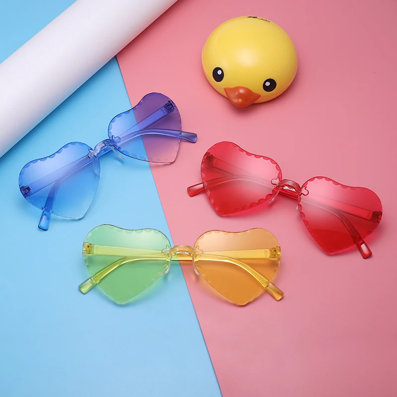 

Wholesale fashionable child glasses kid Love Heart sunglasses Rimless Frame cheap For kids with boy and girl