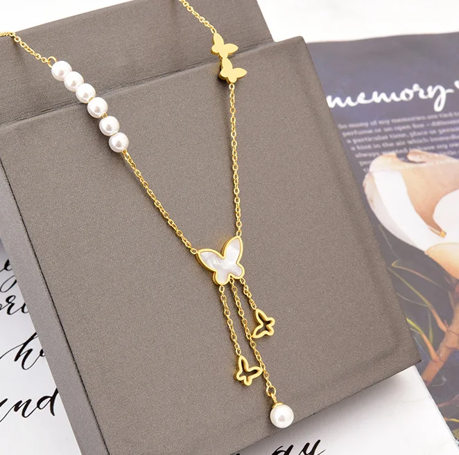

Korean Version of White Shell Butterfly Pearl Necklace Titanium Steel Hollow Long Tassel Pendant Necklace for Women