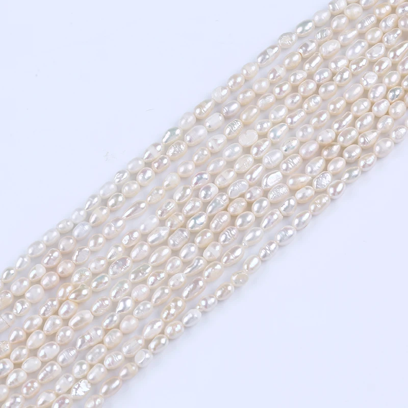 

white rice shape freshwater pearl strands cheap beads