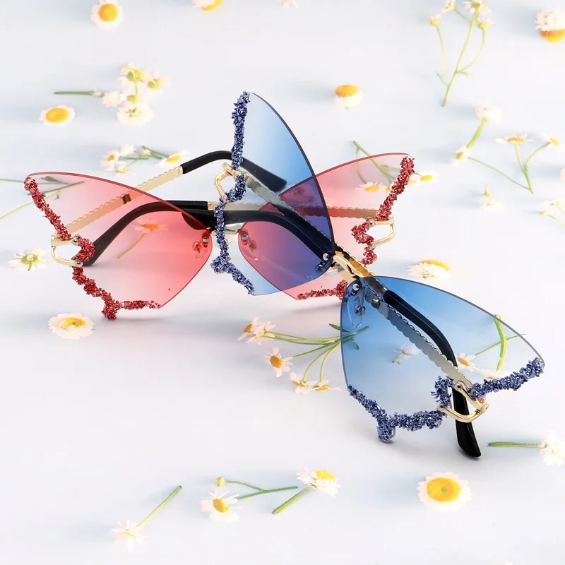 

Luxury Diamond Butterfly Sunglasses Women Men Y2k Rimless Rhinestone Sunglasses Trends Punk Eyewear Shades UV400 Da Sole Donna