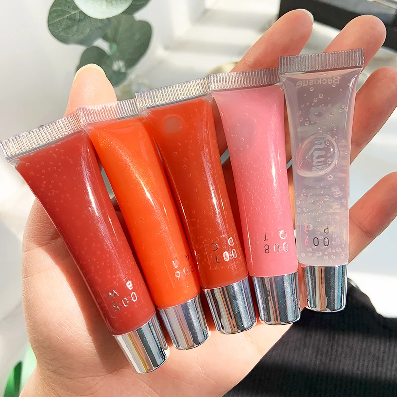 

Pearlescent glistening lip gloss moisturizing transparent lip gloss