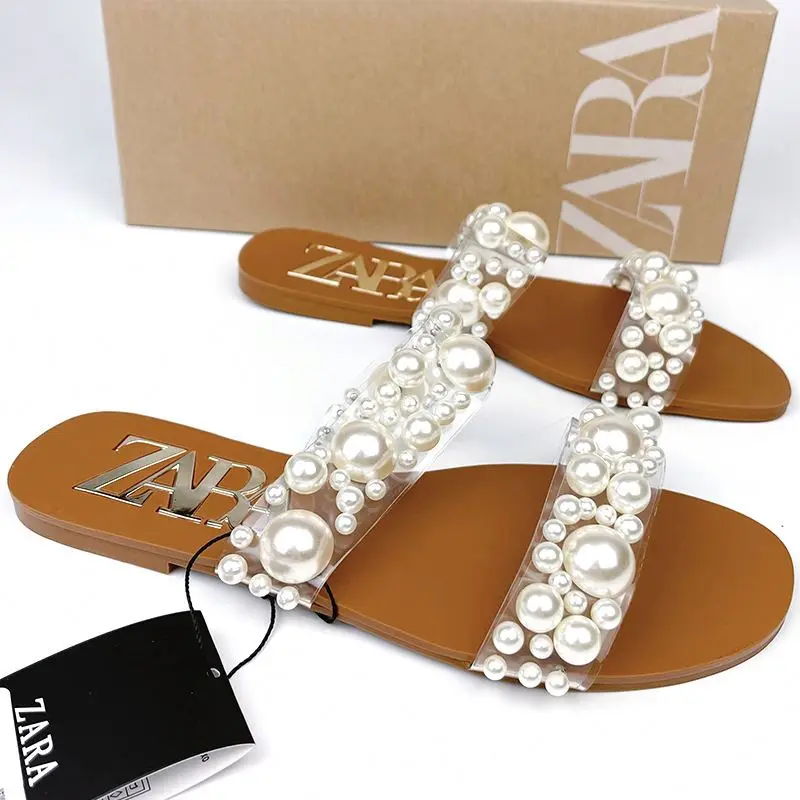 

2021 Europe & American new arrival women's shoes white beaded inlaid beach flat slippers in stock wholesale, White or customized