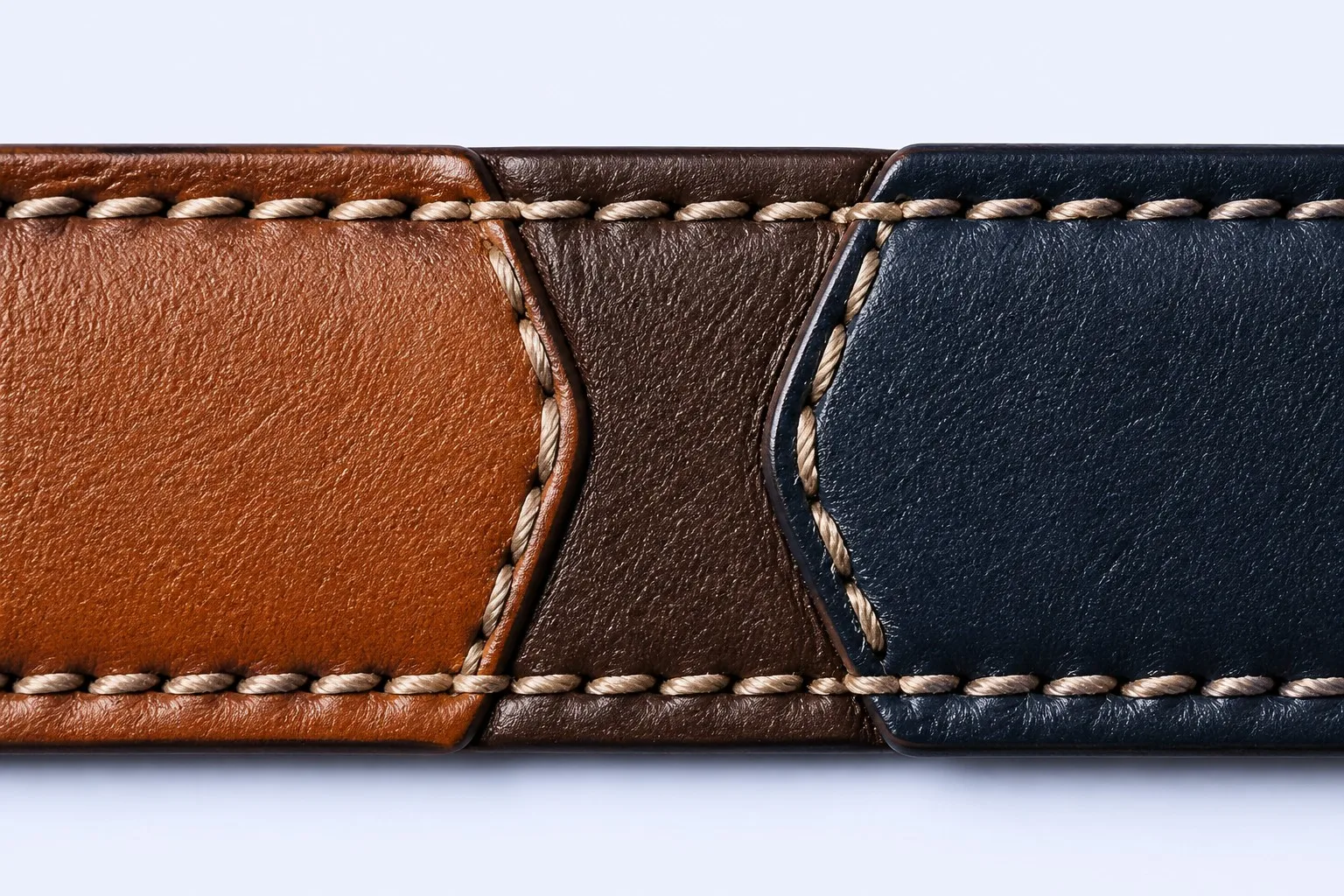 Close-up of contrast saddle stitching on genuine leather panels