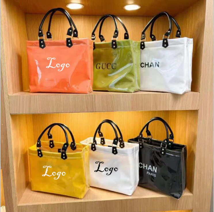 

Promotional Fashion New Design Ladies jelly bag Stadium Approved Clear Tote Bag Handbag Reusable Retail Shopping Bags