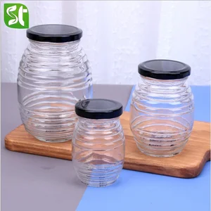 Image of empty pet round clear bear bee shaped honey storage glass jar packing bottle