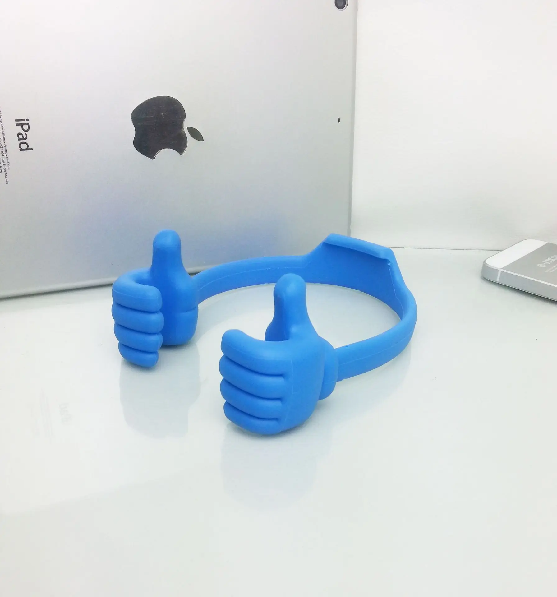 Portable thumbs up finger mobile phone stand