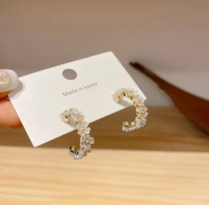 

Temperament new shell flower earrings female ins sweet earrings S925 silver post earrings wholesale