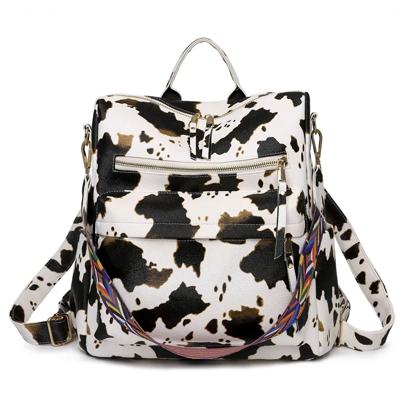 

Convertible Guitar Strap Backpack Purse Cow Print Vegan Leather Backpack For Woman, As pics show