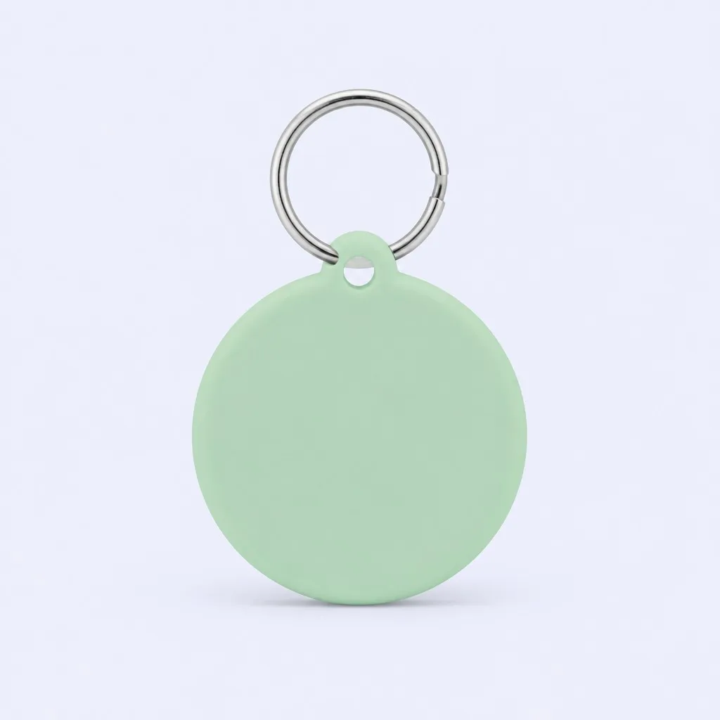 Minimal mint green hang tag keychain on an off-white background