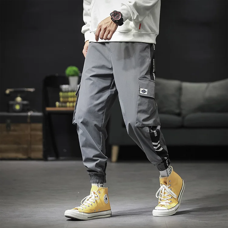 

New men Loose Falling feeling Big pocket Harem pants Wild fashion Comfortable Handsome Leisure Beam foot Cargo pants, Colors