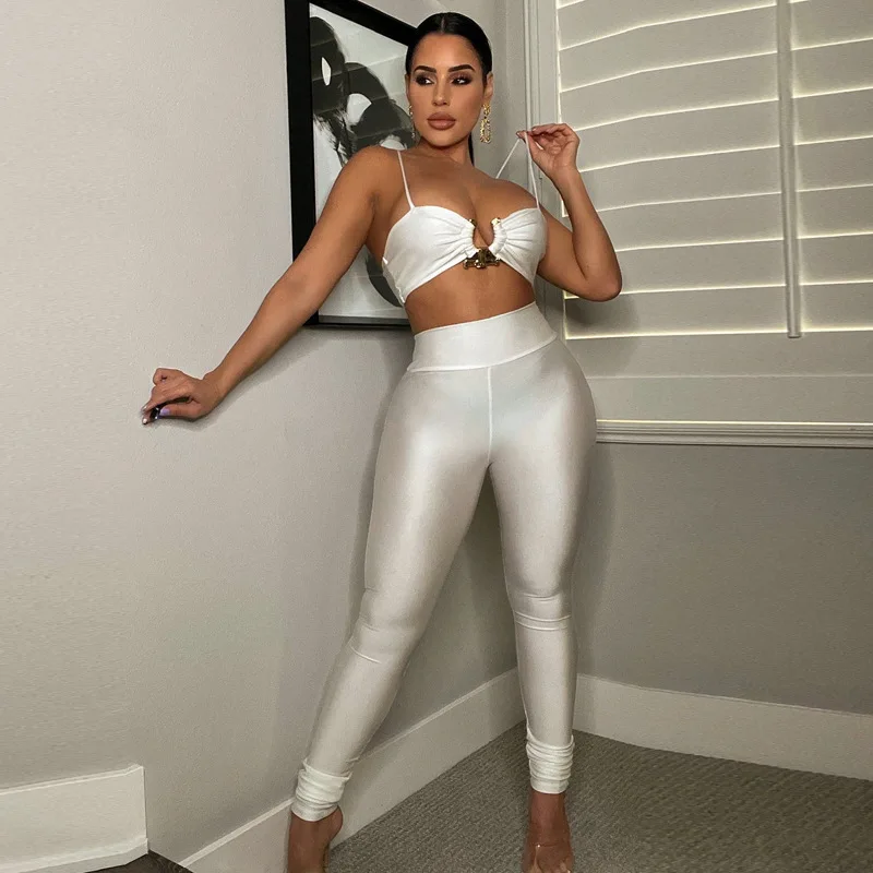 

New sexy hollow perspective two piece knitted hollow vest trousers suit beach vacation leisure suit