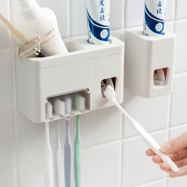 

Custom Logo Automatic Toothpaste Squeezer Plastic Wall Mount Toothbrush Holder Toothpaste Dispenser