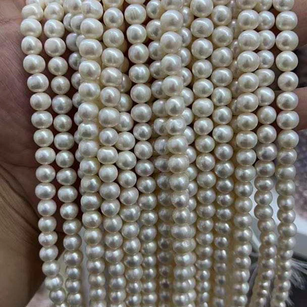 

16 inch 7.3-8.3 mm nature potato shape loose wholesale freshwater pearl in strand