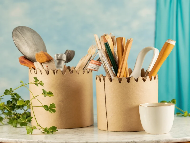 Basic zero-waste crafting tools in recycled containers