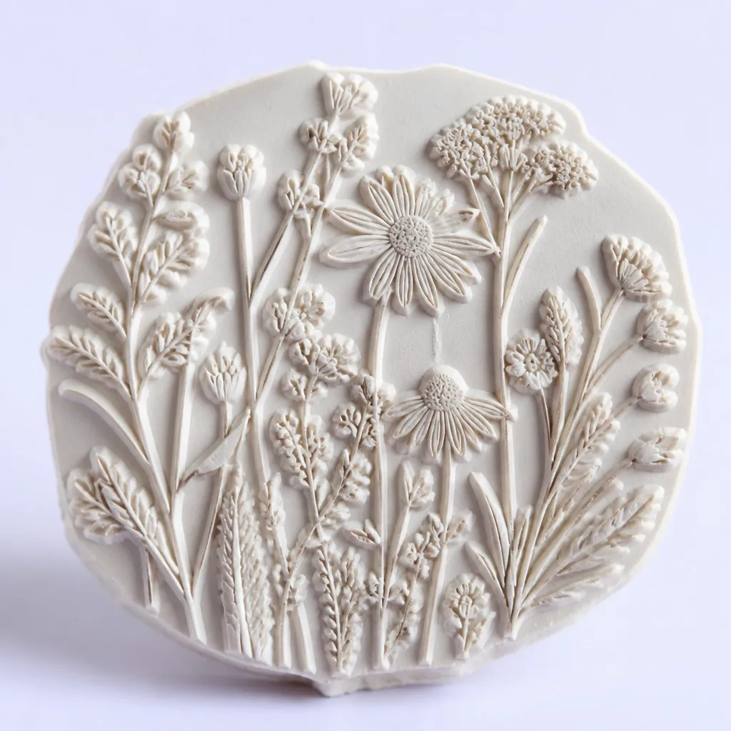 Close-up of a floral pattern engraved on a rubber stamp base
