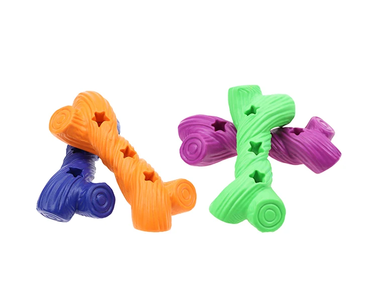 Can be customized durable pet dog bone toys rubber indestructible dog bone toys interactive food leakage dog bone training play.