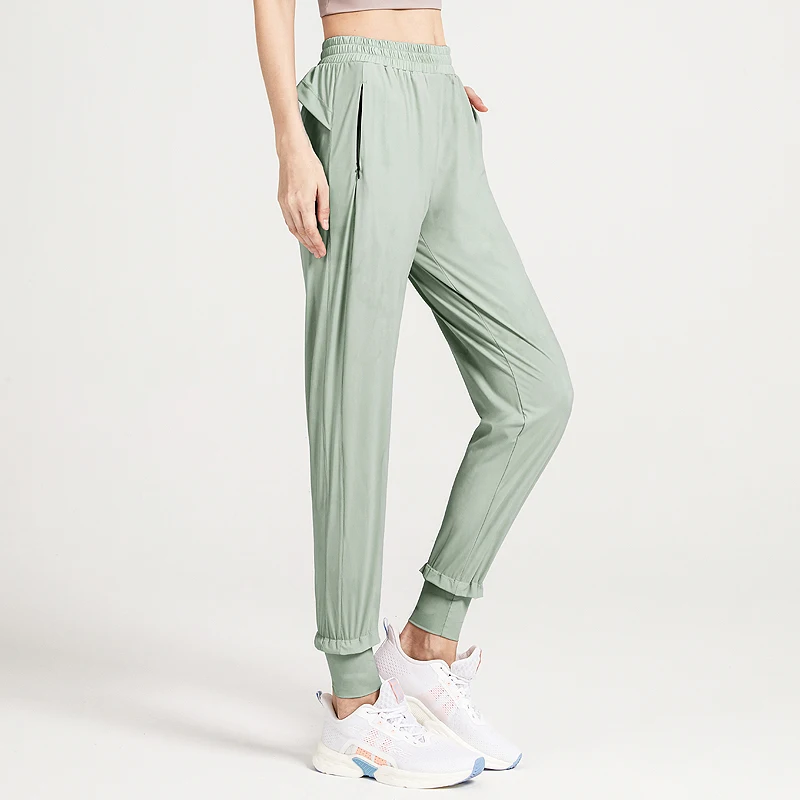 

hot selling pure color loose leisure pants breathable pocket fitness sport pants