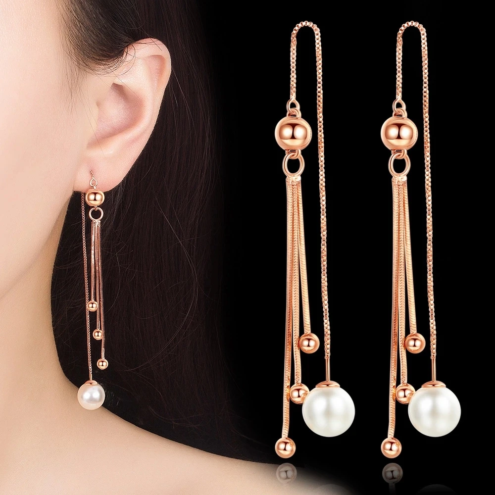

New Fashionable temperament female tassel in the long section of the body pearl earrings Small fresh earrings