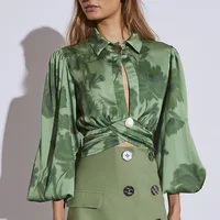 

Tide brand ladies temperament 2020 early spring turtleneck lantern sleeve hollow irregular pleated printed shirt top