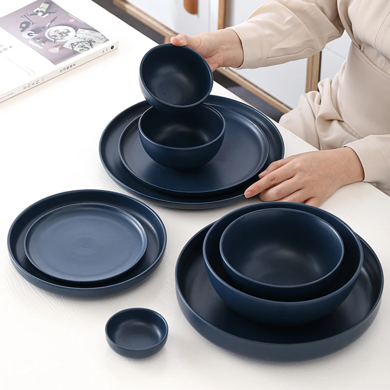 

Matte Navy Blue Color Set Porcelain Round Shape Nordic Style Tableware Dinner Rimmed Plates and Bowls Wholesale Dinnerware