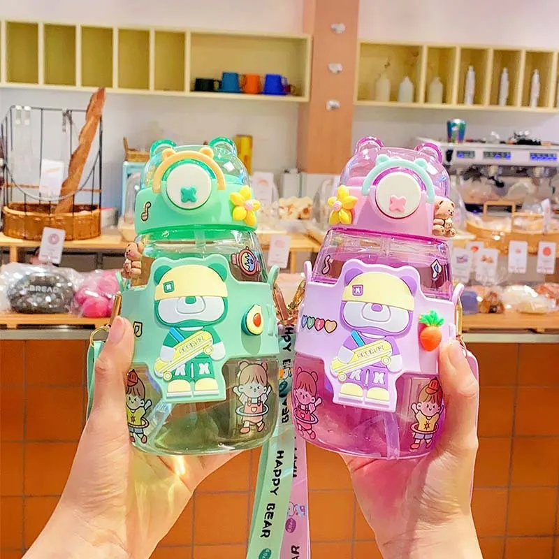 

Wholesale Cartoon cute leakproof juice drinking cup bpa free sport school kids plastic water bottles with straw strap
