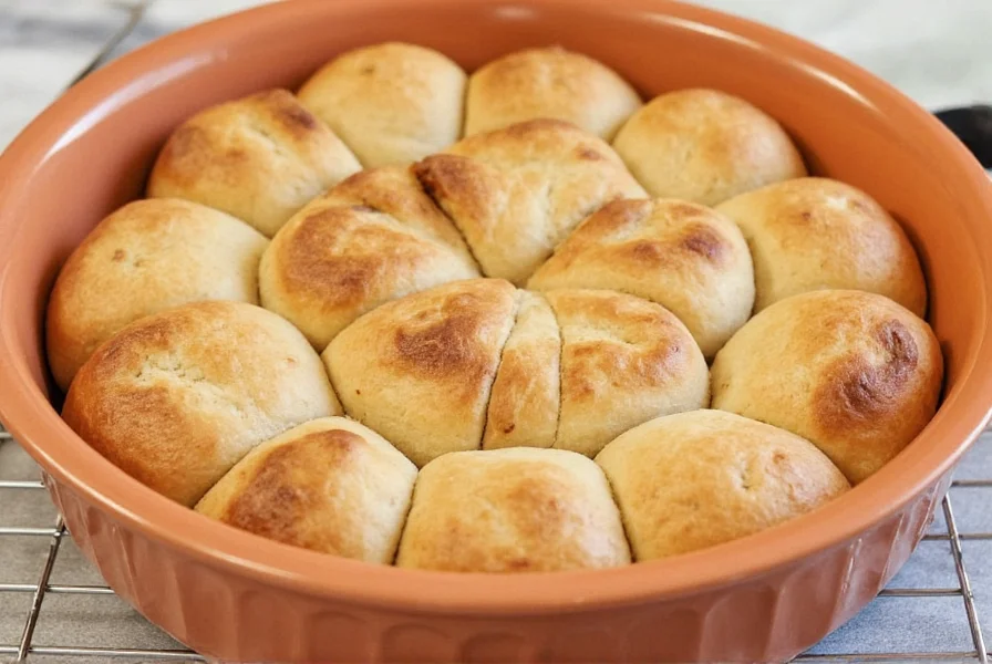 Finished Pillsbury cinnamon buns with melted icing drizzled perfectly on golden brown rolls