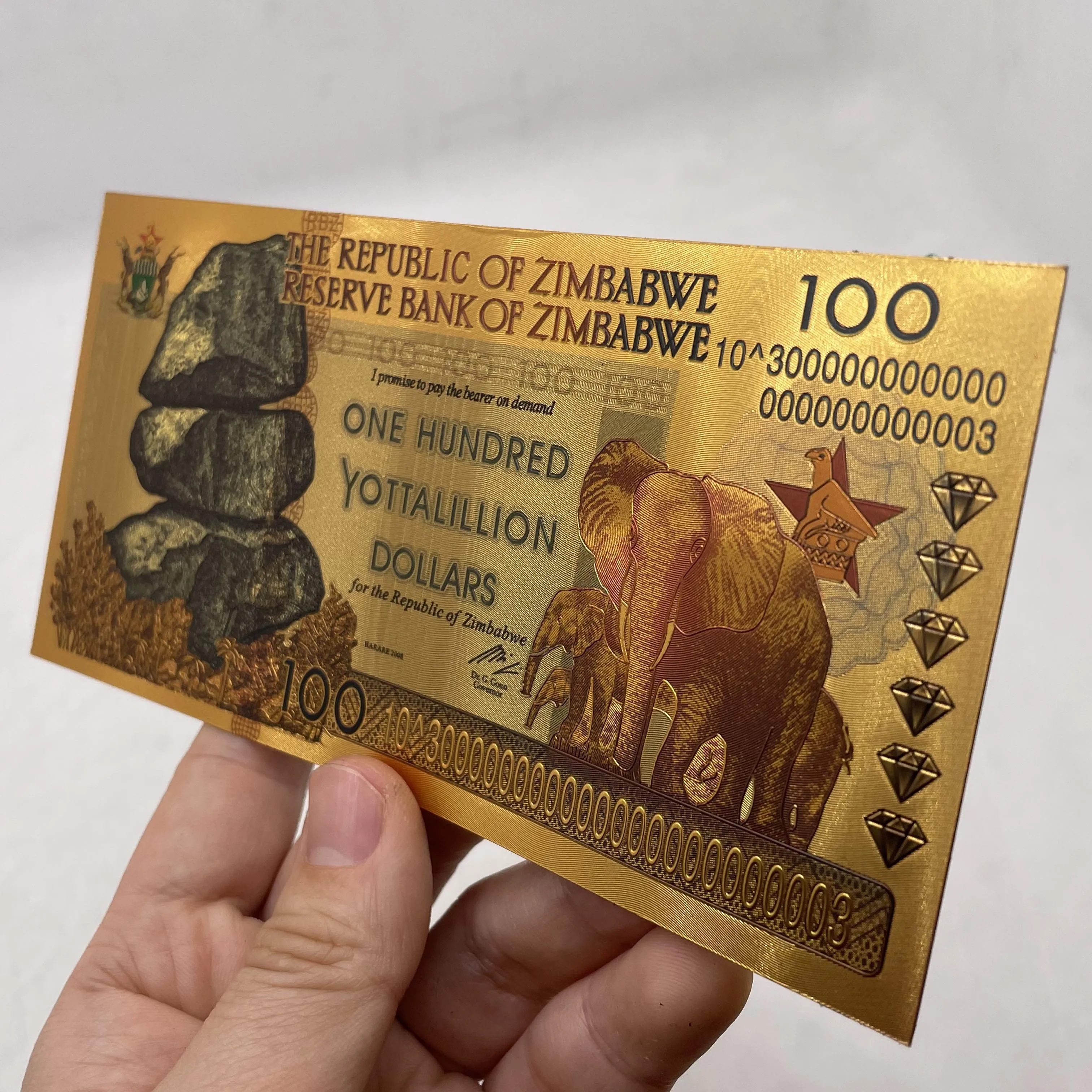 

Wholesale Zimbabwe Banknotes One Hundred Yottalillion Dollars gold foil plastic Money Art Worth Collecting Business Gifts