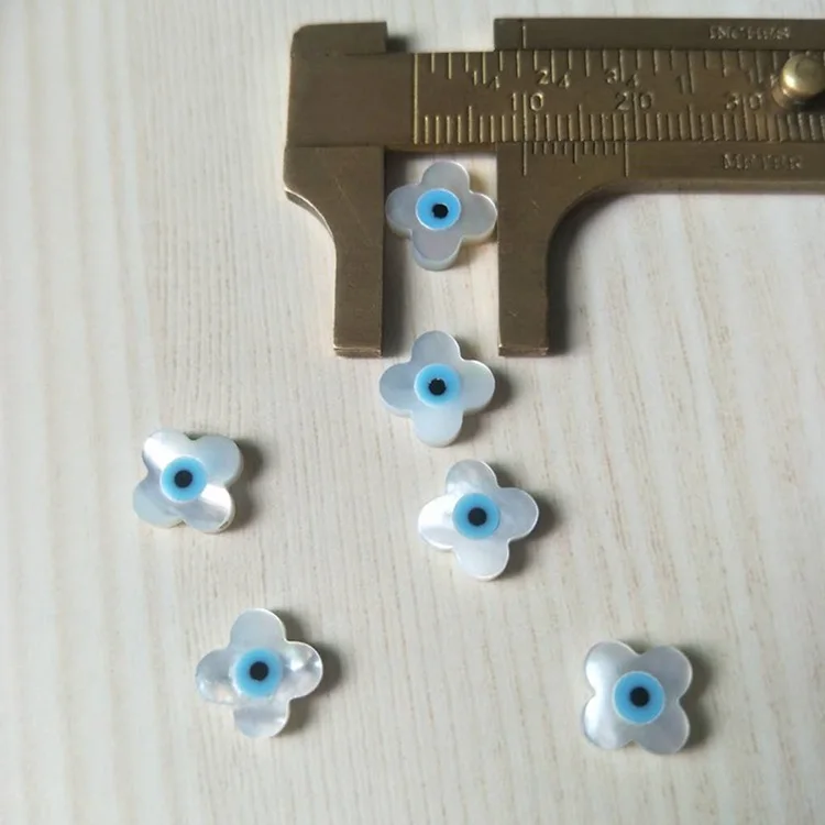 

Wholesale Four petals flower 10x10mm Natural White Shell Devil Eye