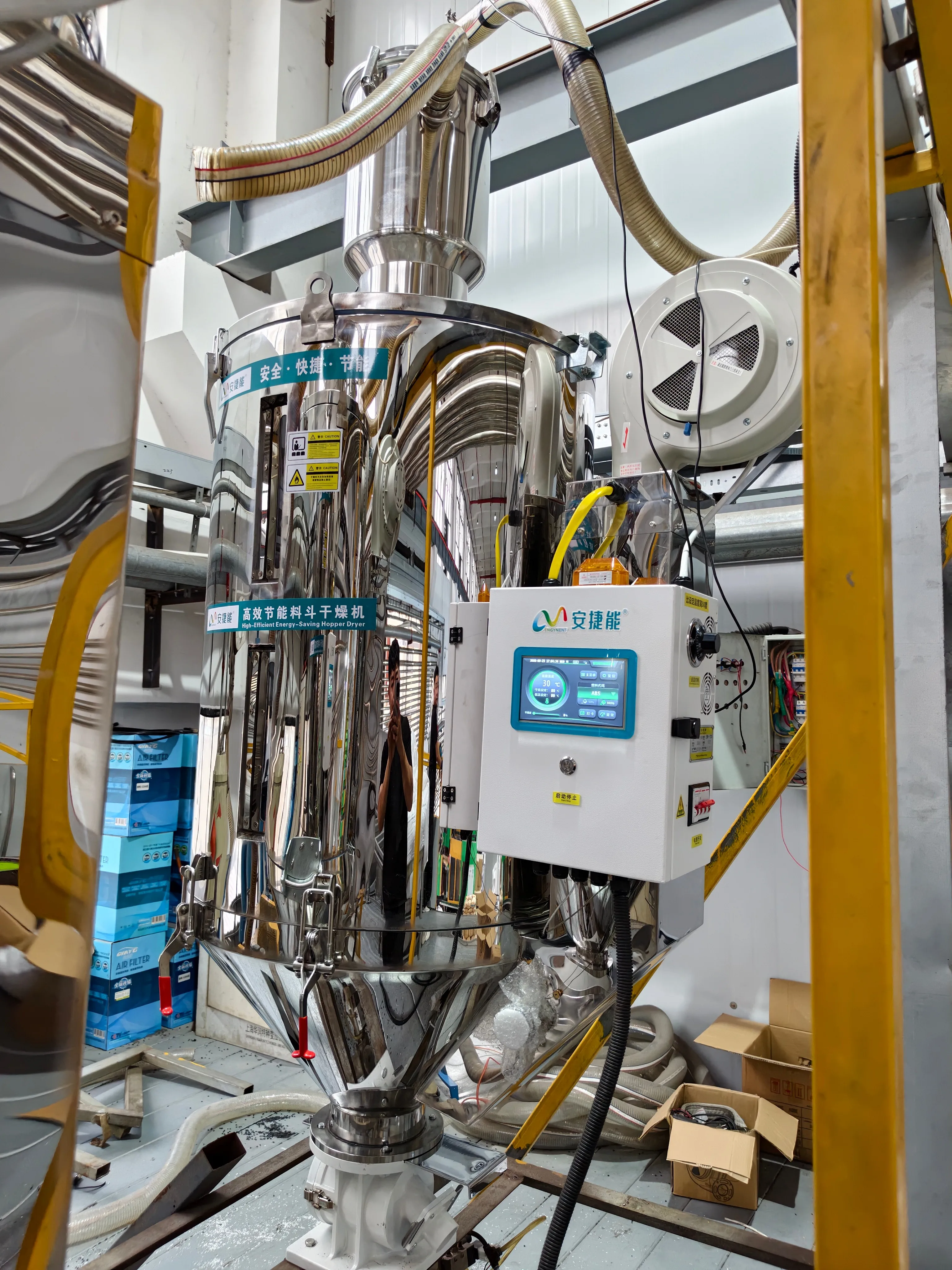 Close-up of the polished stainless steel body and inverter control panel, with real-time temperature readout Close-up of the polished stainless steel body and inverter control panel, with real-time temperature readout