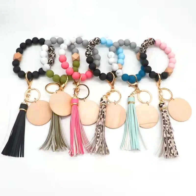 

Diy Cheap Personalized Pu Tassel Wristlet Bangles Wooden Bead Silicone Bead Key Chain Wrist Keychain Pendant Bracelet