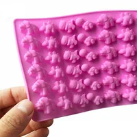 

Reamazing 48 cavity dinosaur shape silicone cake mold easy release chocolate gummy candy mold