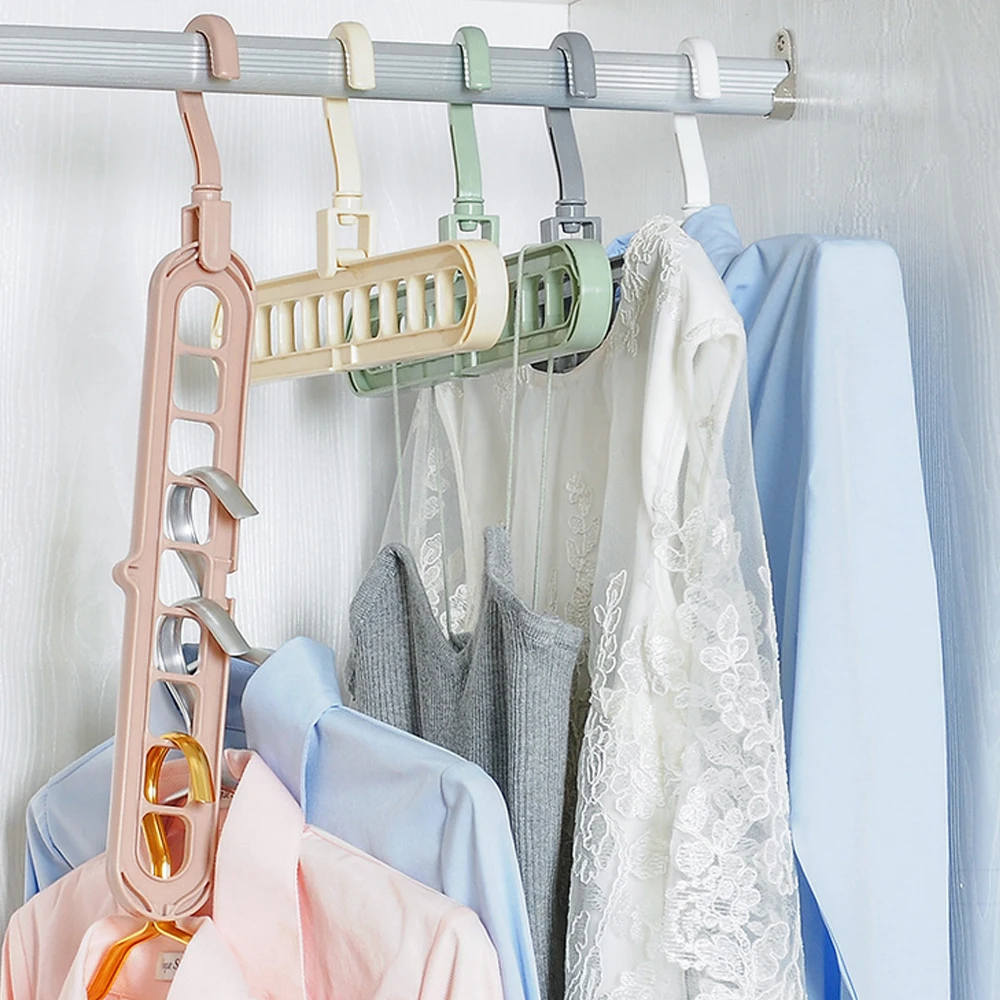 

9 hole Space Saving Hanger 360 rotating magic hanger multi-function folding hanger wardrobe drying clothes storage Color Random