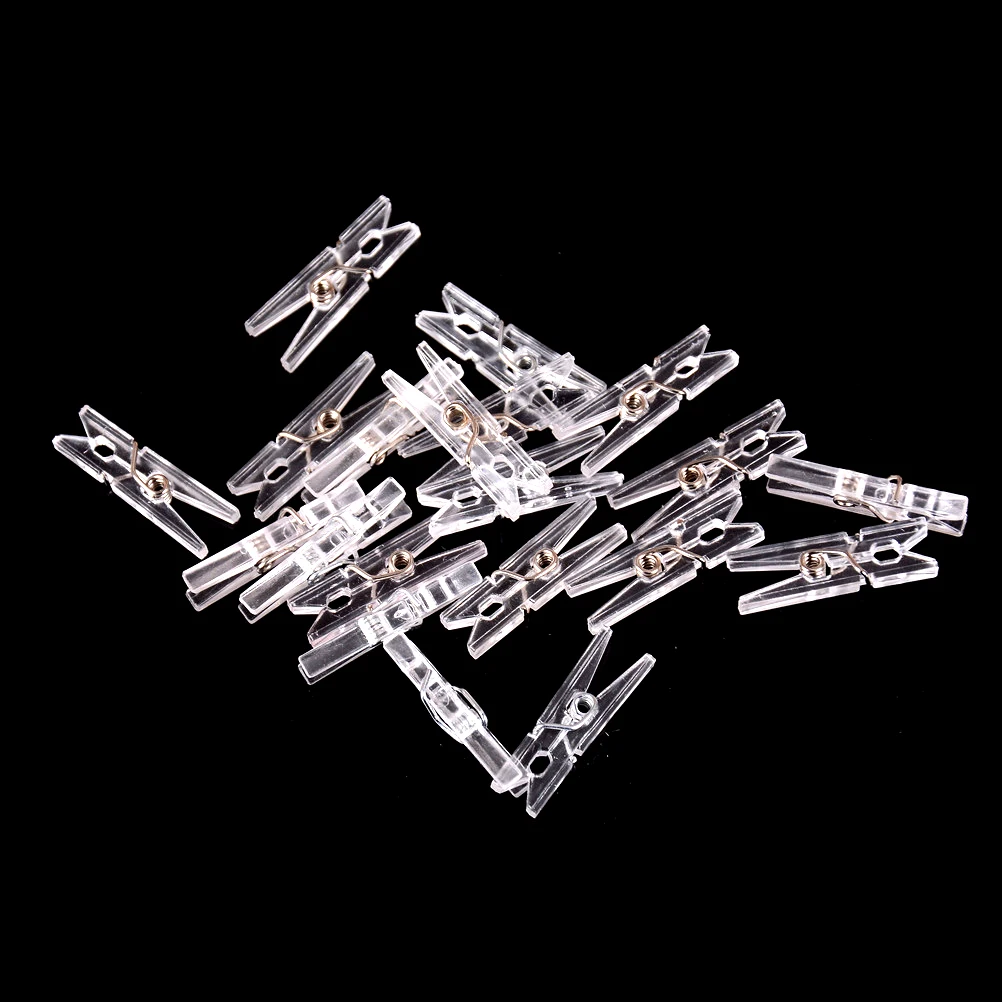 

Free Ship 20PCs/Pack Mini Spring Clear Transparent Clips Clothes Photo Paper Peg Pin Clothespin Craft Party Home Decoration 25mm