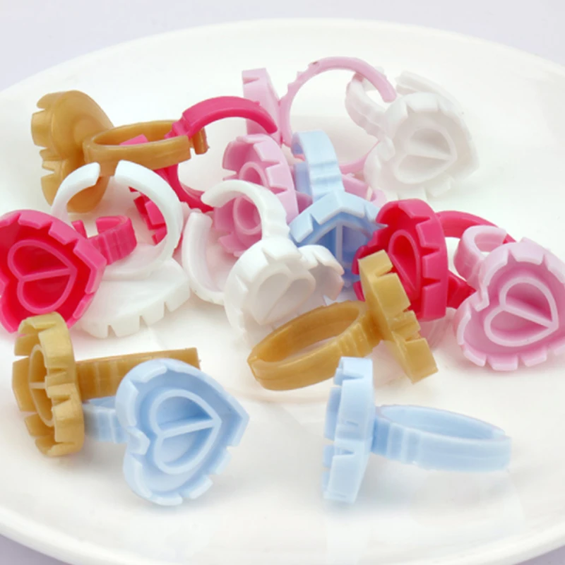 

Wholesale 100Pcs Disposable Lash Extension Plastic Pink Heart Shaped Glue Rings Cup