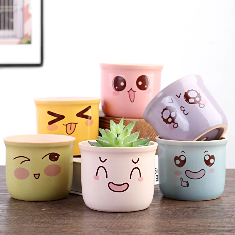 

Factory cheap price cute face ceramic green plant pots Cute expression flower pot medium pottery flower pots plants, Yellow