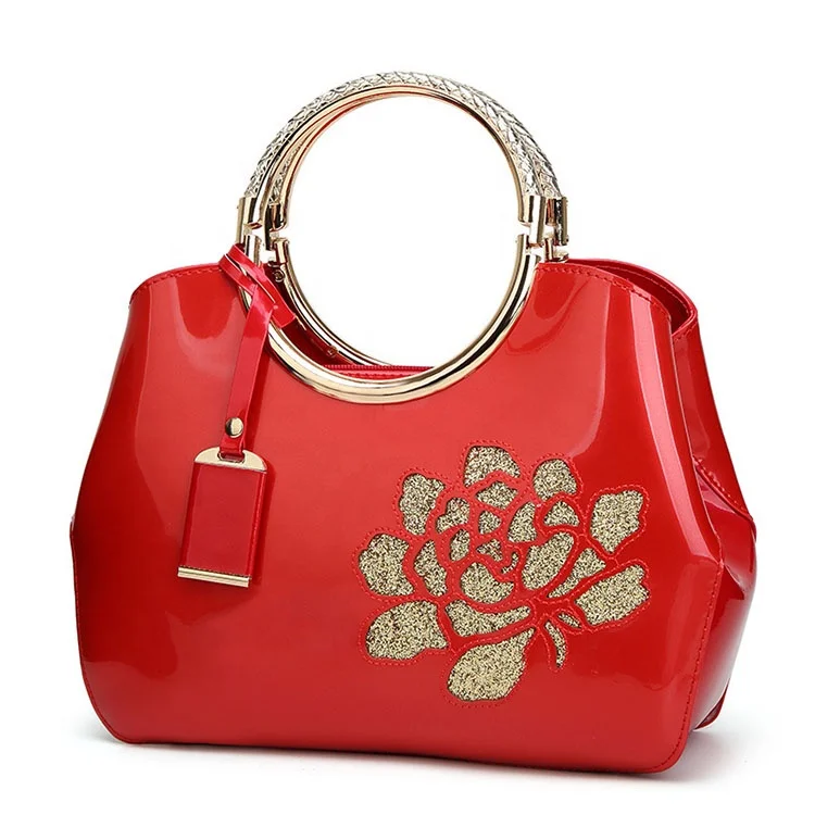 

preferential smooth women leather handbag with embroidery