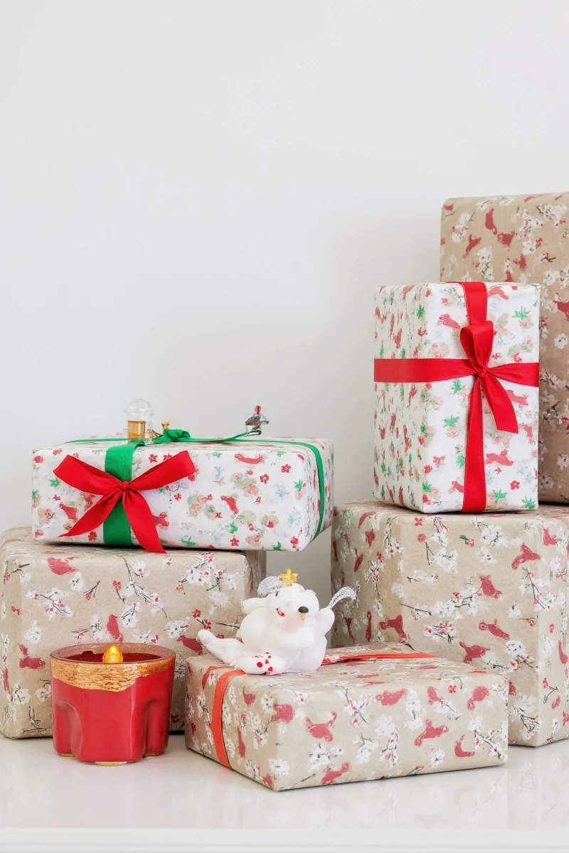 Toy drawer lined with Christmas gift paper