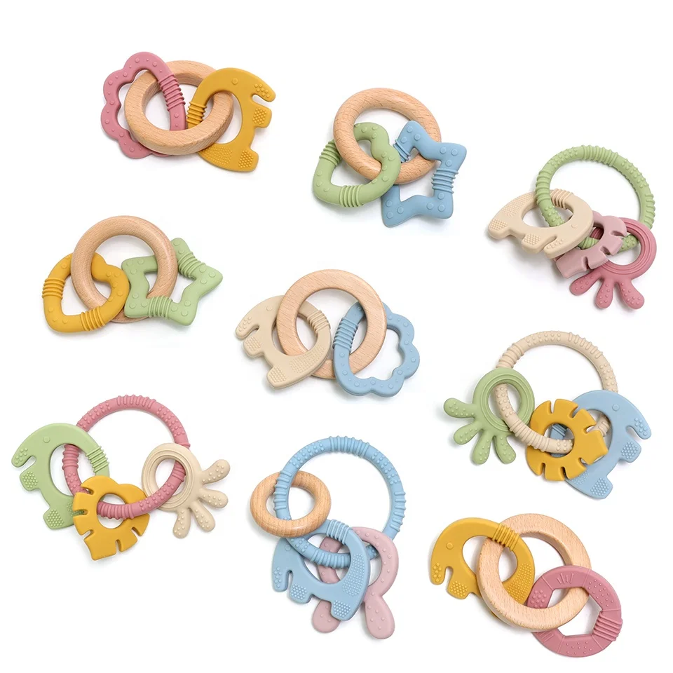 

Bpa free wooden baby rattles toys wooden sensory teething teether ring silicone baby teethers ring for newborn sensory toy