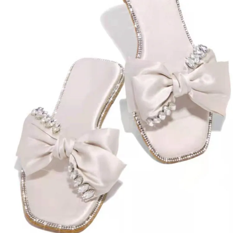 

Summer hot-selling casual bowknot diamond flat sandals women's luxury and noble temperament outdoor women's slippers, Customized color