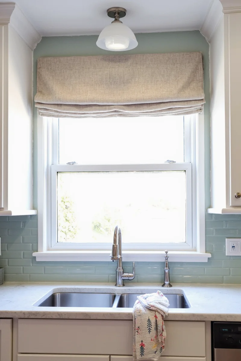 5 genius ways to decorate a large window above your kitchen sink plus a shopping guide