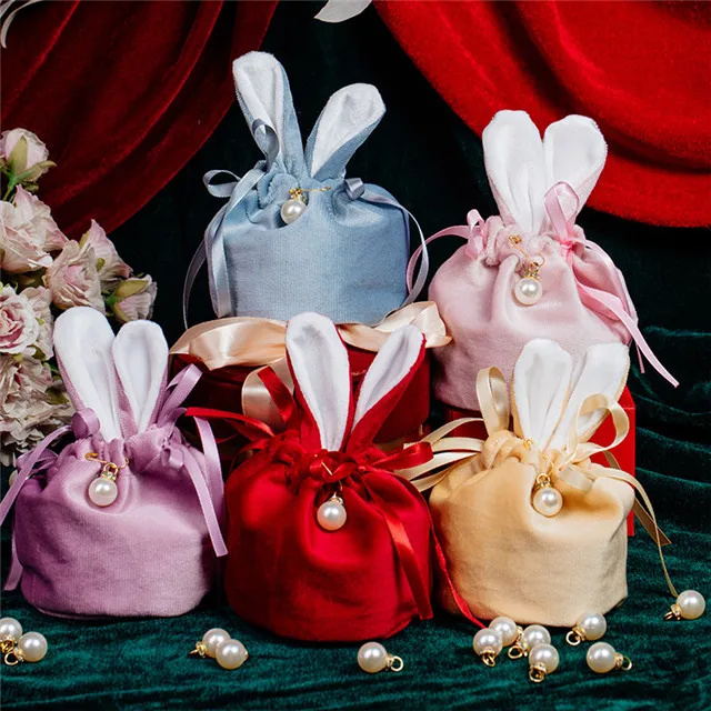 

Wholesale Custom Solid Wedding Creative Rabbit Ears Candy Box Draw String Jewelry Velvet Cloth Gift Packaging Bags, As the photo