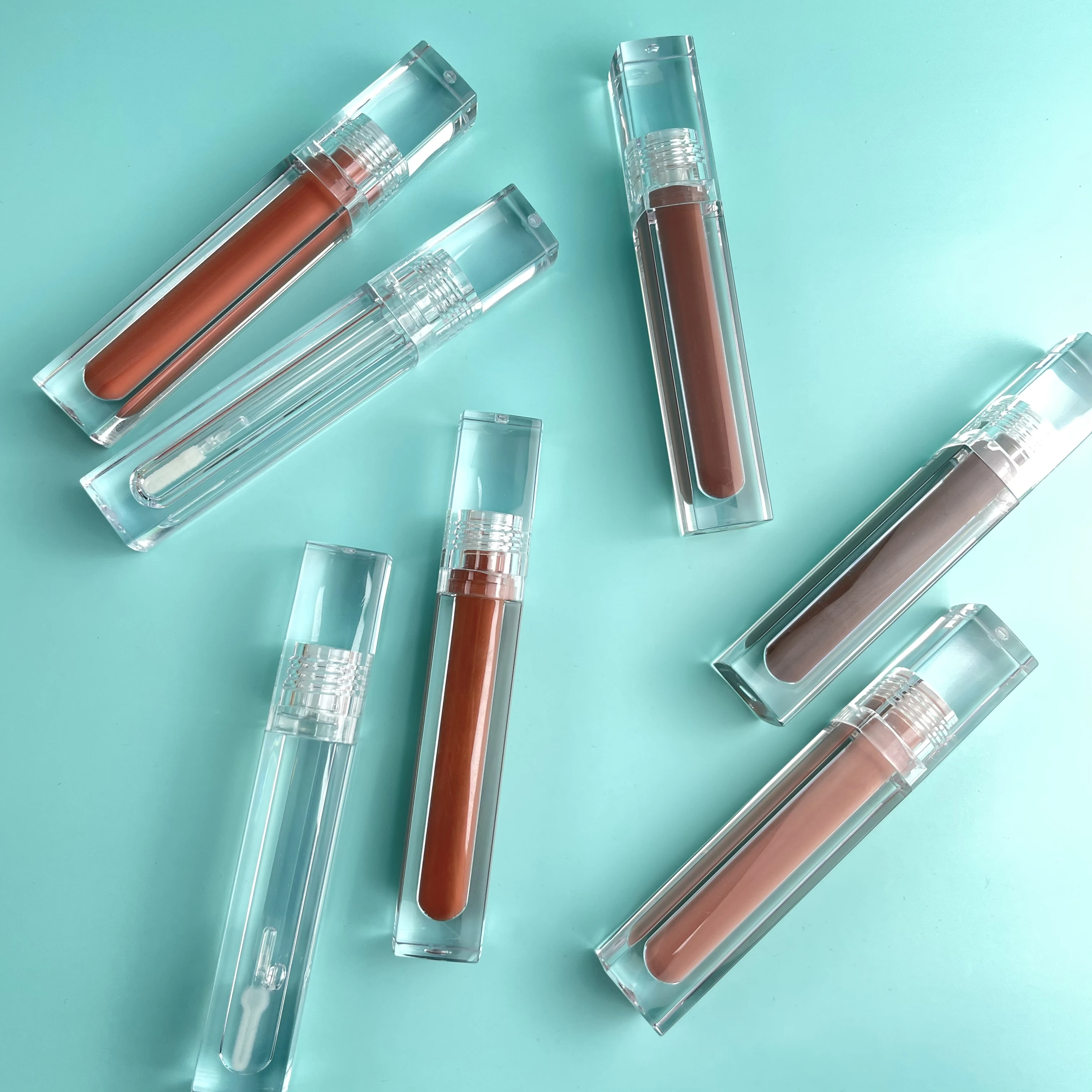 

Bulk high quality clear tube 64 shade nude glossy lip gloss