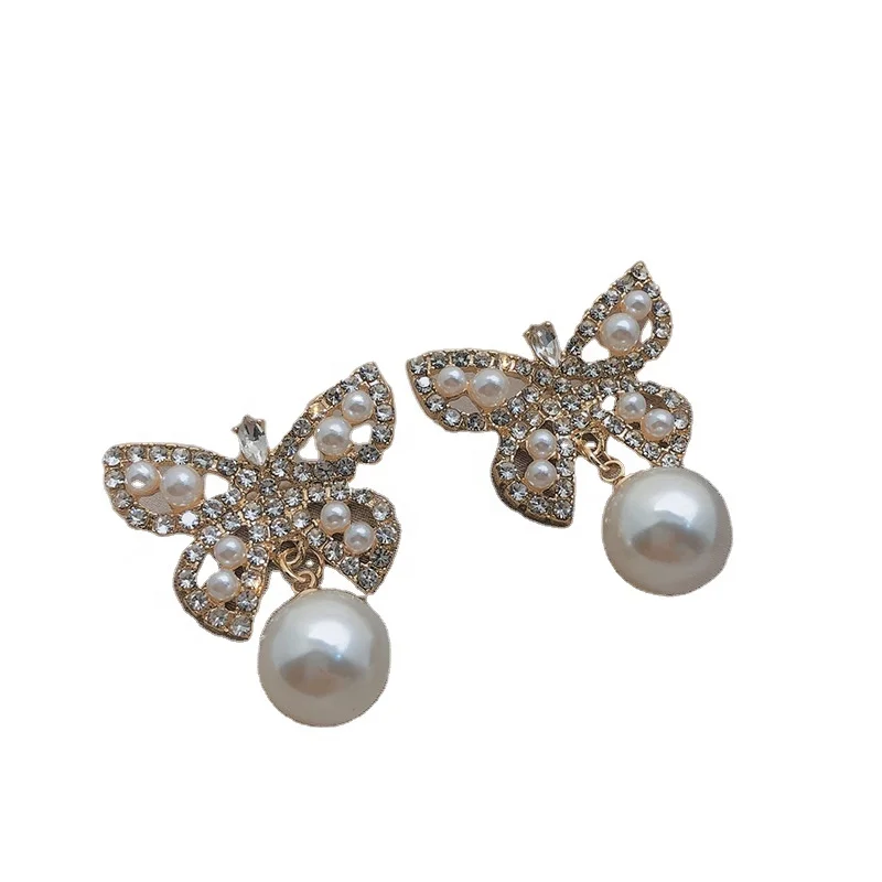 

Korean Fashion women's indifference temperament 925 silver needle Earrings south sea Pearl Butterfly stud Earrings
